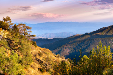 Wall Mural - Sunset view of hills and valleys in the Santa Cruz mountains; South Clara Valley and Diablo mountain range visible in the background