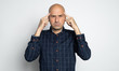 © spaxiax - 40 years old bald man is thinking about a problems. Isolated
