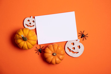 Wall Mural - Blank white halloween card with pumpkins and spiders. Poster invitation mockup