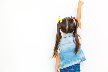 Little baby girl showing something above her, rear view white background