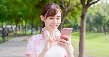 Wall Mural - young asian woman use phone