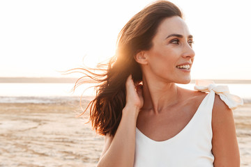 close up of a beautiful young woman wearing summer dress