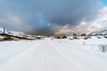 Wall Mural - an ice road leads to the village of teriberka, high above the arctic circle in the russian kola peni