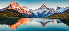 Fantastic Evening Panorama Of Bachalp Lake / Bachalpsee, Switzerland. Picturesque Autumn Sunset In Swiss Alps, Grindelwald, Bernese Oberland, Europe. Beauty Of Nature Concept Background..