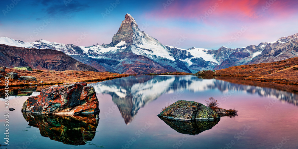 Obraz na płótnie Panoramic morning view of Stellisee lake with Matterhorn / Cervino peak on background. Impressive autumn scene of Swiss Alps, Zermatt resort location, Switzerland, Europe.  w salonie