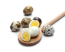 Boiled Quail Eggs And Wooden Spoon Isolated On White Background