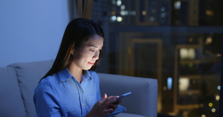 Poster - Woman use of mobile phone at night