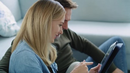 Wall Mural - Mature couple with tablet making a selfie