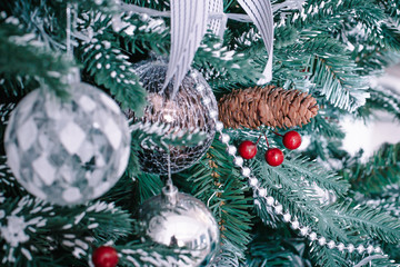Wall Mural - Closeup on Christmas tree decoration over festive background