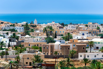 tunisia. djerba island. guellala village with the mediterranean sea in a background