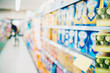 © themorningglory - Abstract blurred food and drink on shelf in supermarket