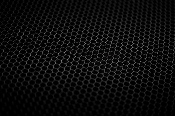 Perforated sheet metal. Black metal texture Steel background.