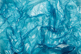 Fototapeta  - Background, Blue plastic bag closeup