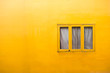 © K.Pornsatid - yellow cement wall  and  window.