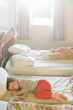 © FOLIO - Boy sleeping on bed