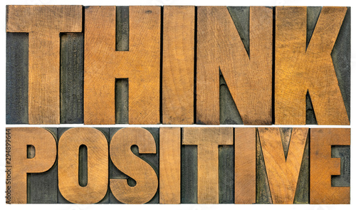 Fotomural Think positive word abstract in wood type