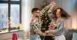 © Syda Productions - celebration, fun and holidays concept - happy couple wearing ugly sweaters dancing at christmas party