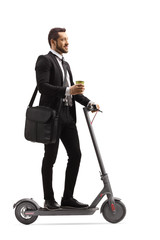 Sticker - Young professional man with a laptop case and a takeaway coffee on an electric scooter