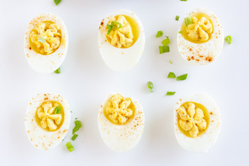 Wall Mural - Deviled Eggs on White Background