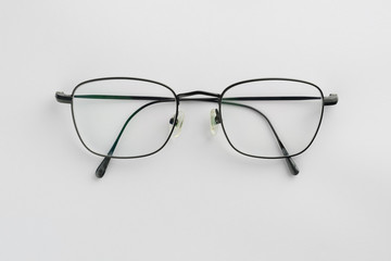 Black glasses on white background