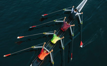 High Angle View Of Unrecognizable Male Crew Racers, Lake Union, Seattle, Washington,View From Above Of Crew Racers Rowing Scull Boat