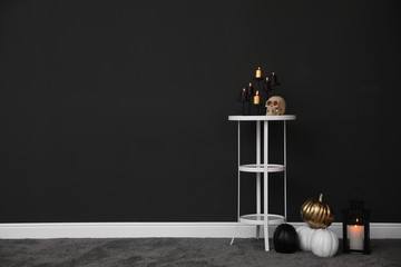 Halloween decor in room, space for text. Idea for festive interior