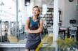 © Westend61 - Business owner standing in front of her coffee shop