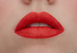 © Westend61 - Made up red lips, close-up