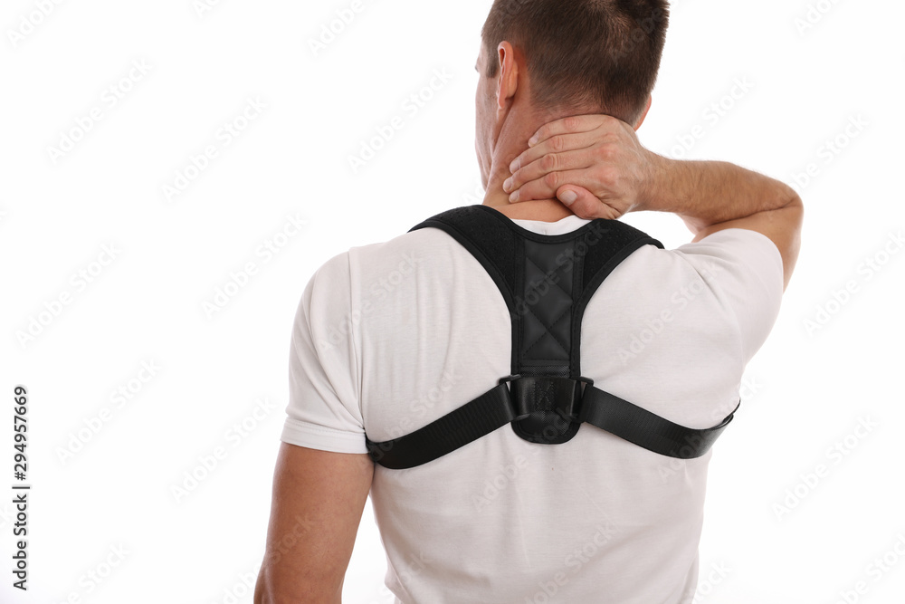 Man with posture corrector. Scoliosis, Kyphosis treatment - obrazy, fototapety, plakaty 