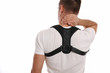 © dream@do - Man with posture corrector. Scoliosis, Kyphosis treatment