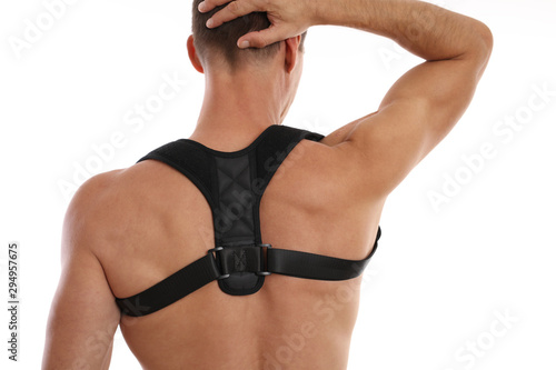 Fotografía Attractive muscular man with posture corrector