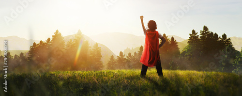 Cuadros en Lienzo child dreaming of super hero in the mountain
