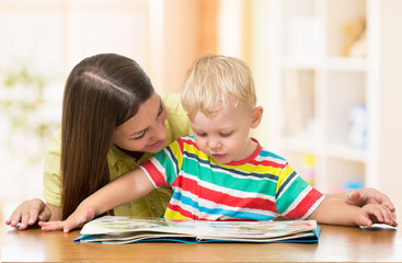 Speech therapist teacher and little child boy on private lesson