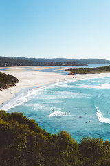 Wall Mural - Beautiful and isolated Ocean Beach in Denmark, Western Australia. The surfers are going out to surf where the river mouth meets the ocean in an iconic surf location. 