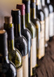 © volff - Line of wine bottles. Close-up.