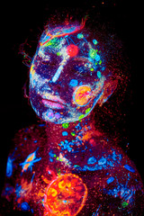 Wall Mural - uv painting of a universe on a female halloween body portrait