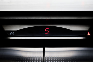 led digital display in elevator pointing to current floor