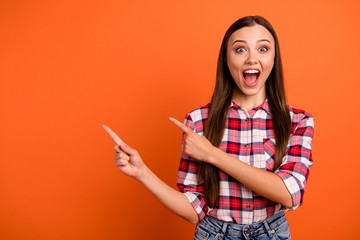 Sticker - Portrait of her she nice attractive crazy overjoyed cheerful straight-haired girl pointing two forefingers aside great solution ad advert isolated on bright vivid shine vibrant orange color background