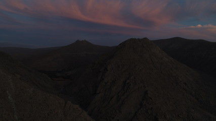 walk through a beautiful landscape with the sunset between the sky and the land