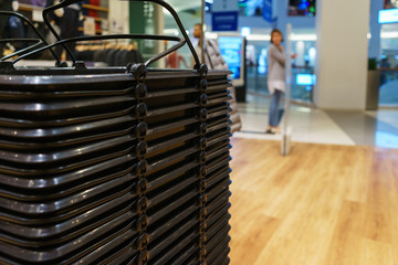 Canvas Print - Fashionable clothes on hangers in a store.