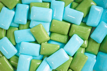 Gums. A Closed Up Details Of Colorful Gum In Blue And Green.