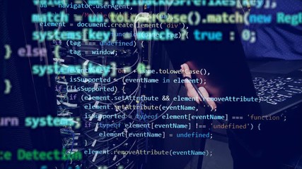 Wall Mural - programming code is coming up above the man typing on the laptop
