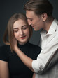 © Dima Aslanian - Young beautiful couple in love posing in studio