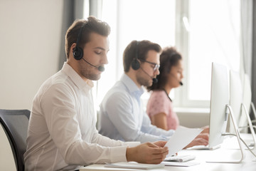 Wall Mural - service phone operators sitting at workplaces communicating with customers distantly