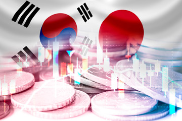 Wall Mural - Japan and South Korea flag on investment chart and coins. Now both countries have economic and patriotic conflict.