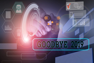 Wall Mural - Handwriting text Goodbye 2019. Conceptual photo expressing good wishes during parting at the end of the year Male human wear formal work suit presenting presentation using smart device