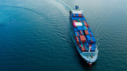 Wall Mural - Aerial view cargo ship transportation of business logistic sea freight, Cargo ship, Cargo container in factory harbor at industrial estate for import export around in the world, Trade Port / Shipping