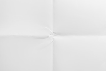 White paper folded in four, texture background