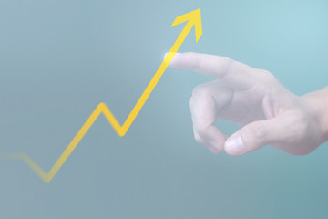 Hand touching  graphs of financial indicator and accounting market economy analysis chart