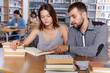 © JackF - Young people preparing for exam in library